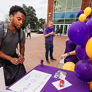 Students write messages to ECU donors during Pirate Nation Gives. The university raised more than $8.4 million during its sixth annual day of giving. 