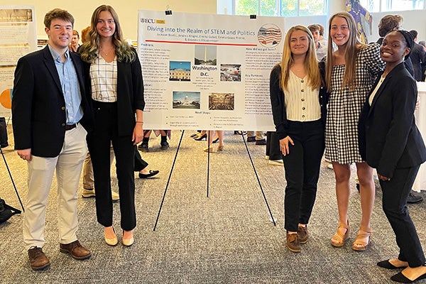 East Carolina University Honors College students Jackson Bostic, from left, Emma Gebel, Braddock Rhodenhiser, Emma Grace Primm and Andrea Knight present their project at the final HNRS 3000 class in April.