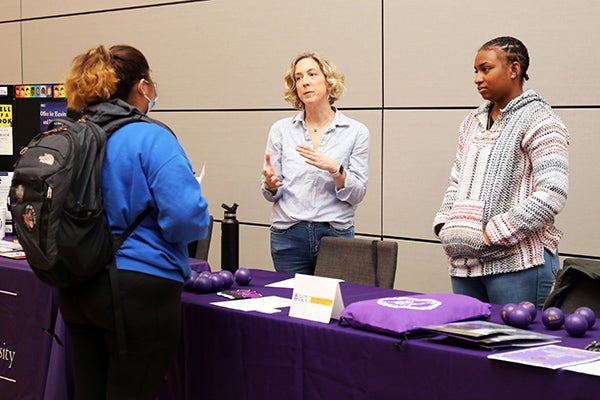 Sutherland and Hall talk to a student about the McClammy Counseling and Research Lab.