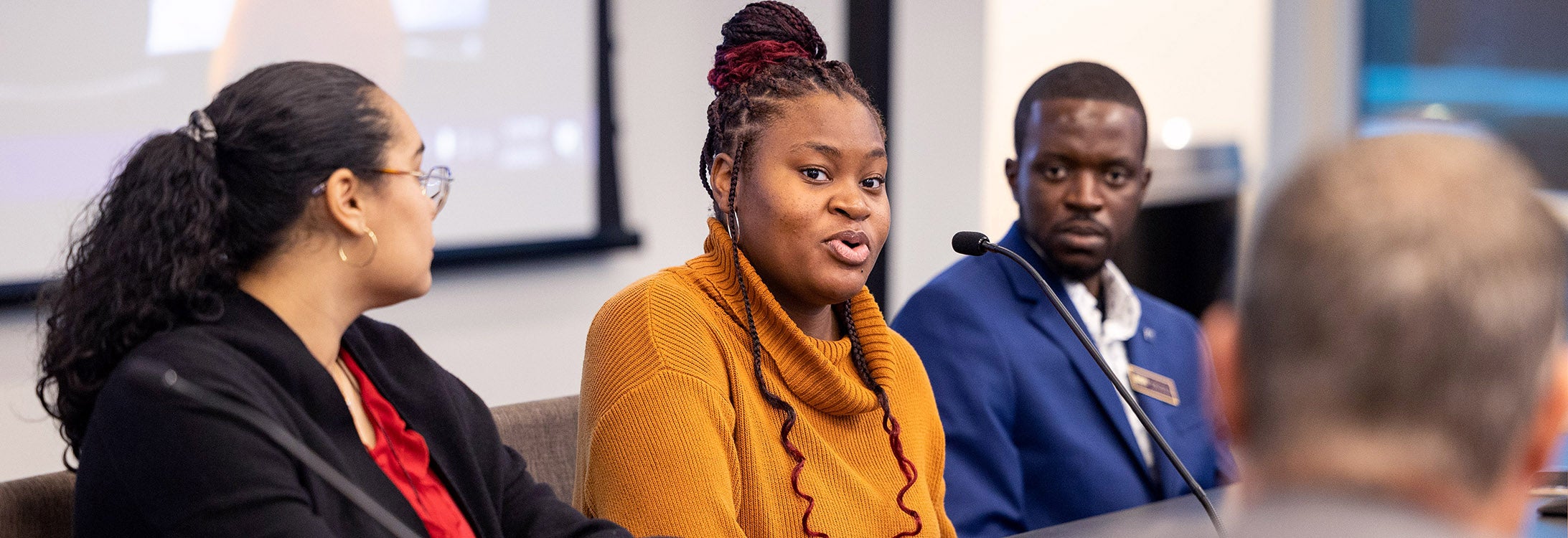 Student Iyaira Williams discusses her involvement with the Purple Pantry during the East Carolina University's February Board of Trustees meeting on Thursday.