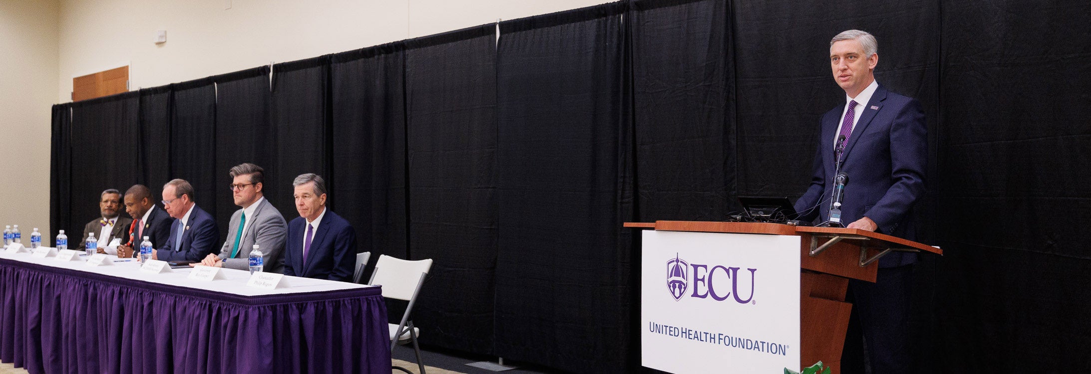 East Carolina University Chancellor Philip Rogers joins Gov. Roy Cooper, and additional state and campus leaders, to announce a $3.2 million United Health Foundation grant.