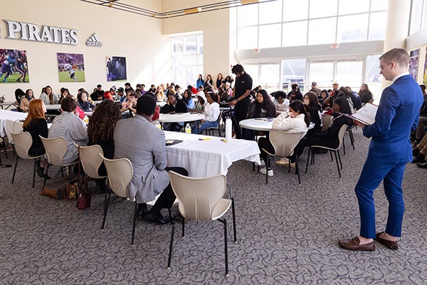 Approximately 100 area high school students listen to a panel of hospitality recruiters discuss the hospitality industry and its available careers at the East Carolina University School of Hospitality Leadership Career Fair.