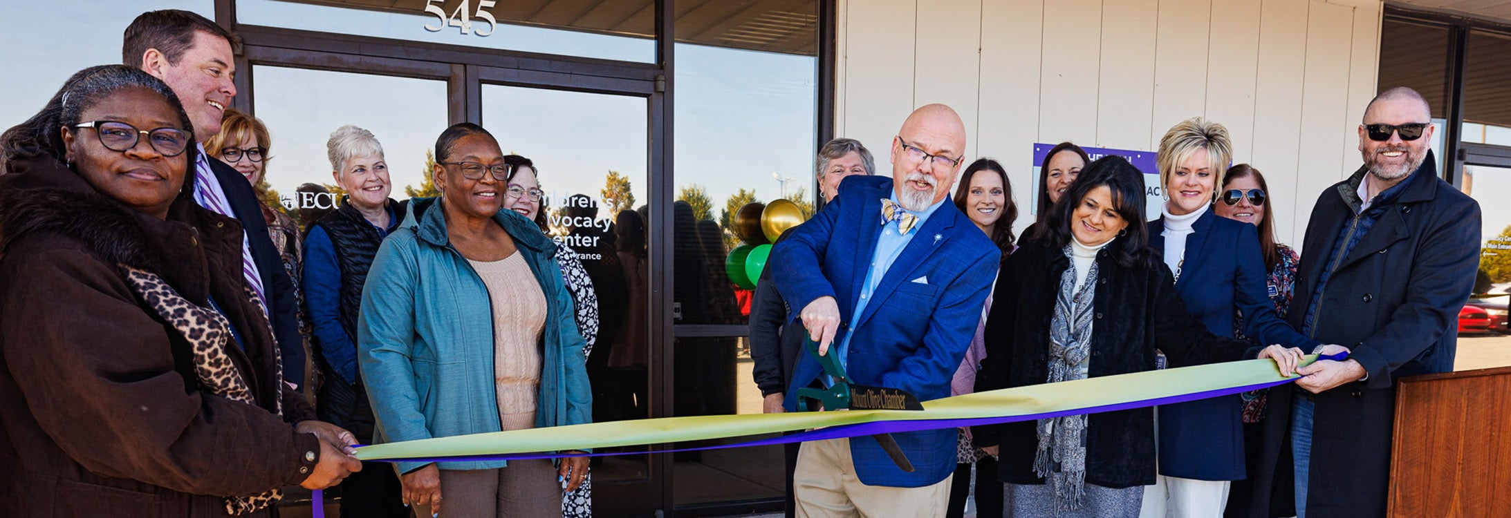 Representatives from ECU, TEDI BEAR Children’s Advocacy Center and the Mount Olive community celebrate the Jan. 27 opening of the Mount Olive Children’s Advocacy Center.