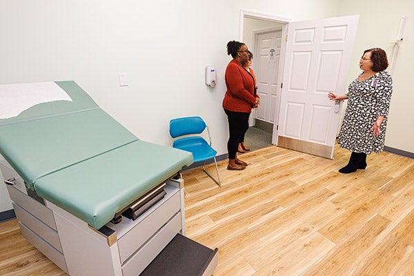 Members of the community and representatives of children’s advocacy centers tour the Mount Olive Children’s Advocacy Center after a ribbon-cutting ceremony on Jan. 27.