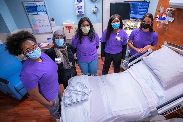 East Carolina University students volunteer as birthing companions at the ECU Health Medical Center in Greenville, North Carolina.