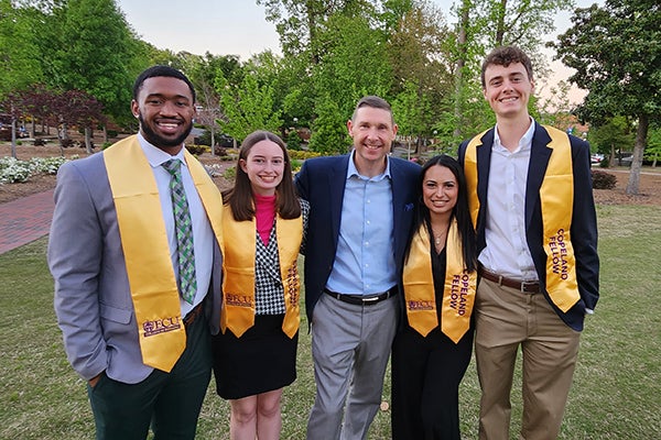 Copeland Fellows were awarded their graduation stoles for completing the inaugural Copeland Diversity and Inclusion Fellowship. Pictured, from left to right, Jonathan Coleman, Aurora Shafer, Mark Copeland, Evelyn Gonzalez and Grant Smith.