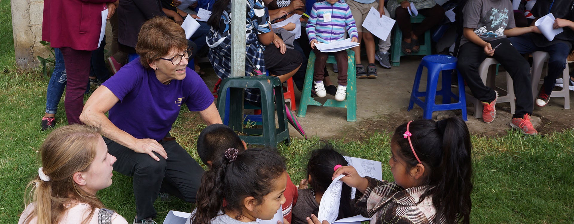 Larson speaks with Guatemalan children about oral health during an ECU nursing student-run education engagement in Guatemala.