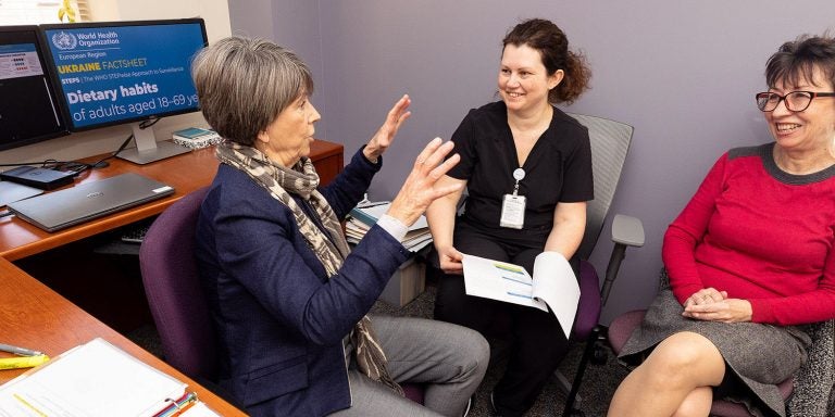 Kim Larson, left, Ganna Rozumna and Natalia Sira discuss a nursing collaboration project. Larson is the first member of East Carolina University's College of Nursing to receive a Fulbright Scholar award.