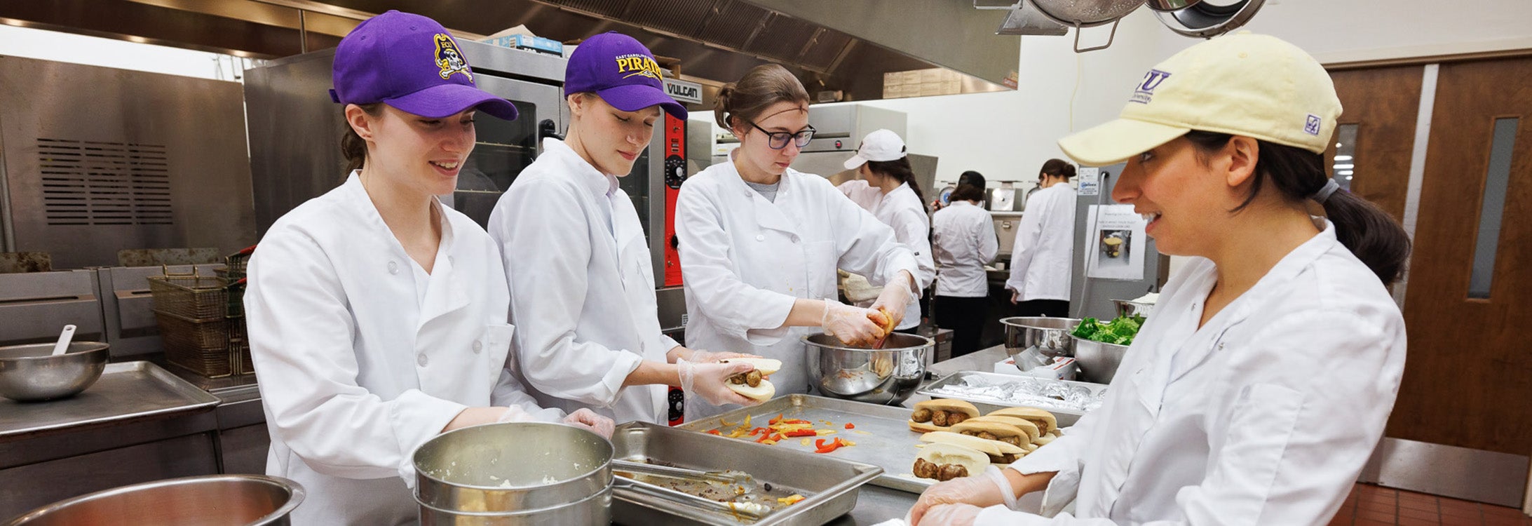 East Carolina University nutrition science students prepare and serve an Italian lunch in the Rivers Building.