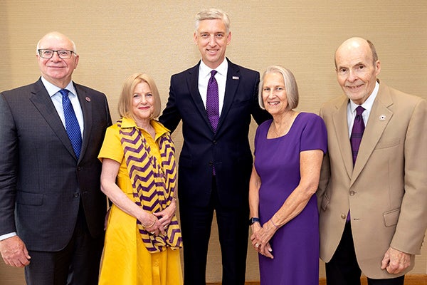 Robert and Amy Brinkley, left, and Pat and Lynn Lane, right, were honored by Chancellor Philip Rogers for their historic commitment to ECU.