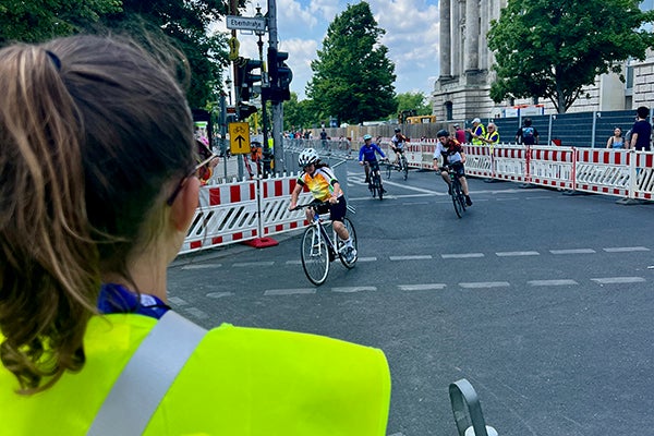 ECU’s Katherine Smyth cheers as cyclists compete during the Special Olympics World Games in Berlin.
