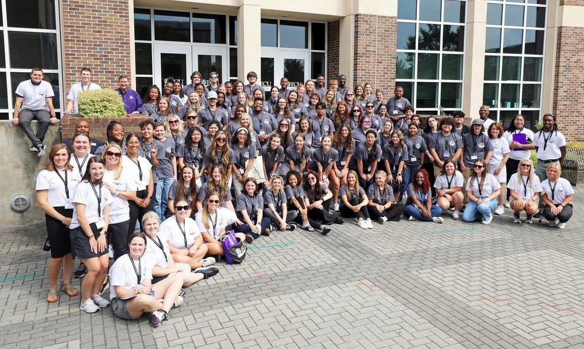 East Carolina University education major Lexi Lozner, far left in second row, served as a staff member and mentor for high school students who attended the Future Teachers of North Carolina symposium hosted by the College of Education in June.