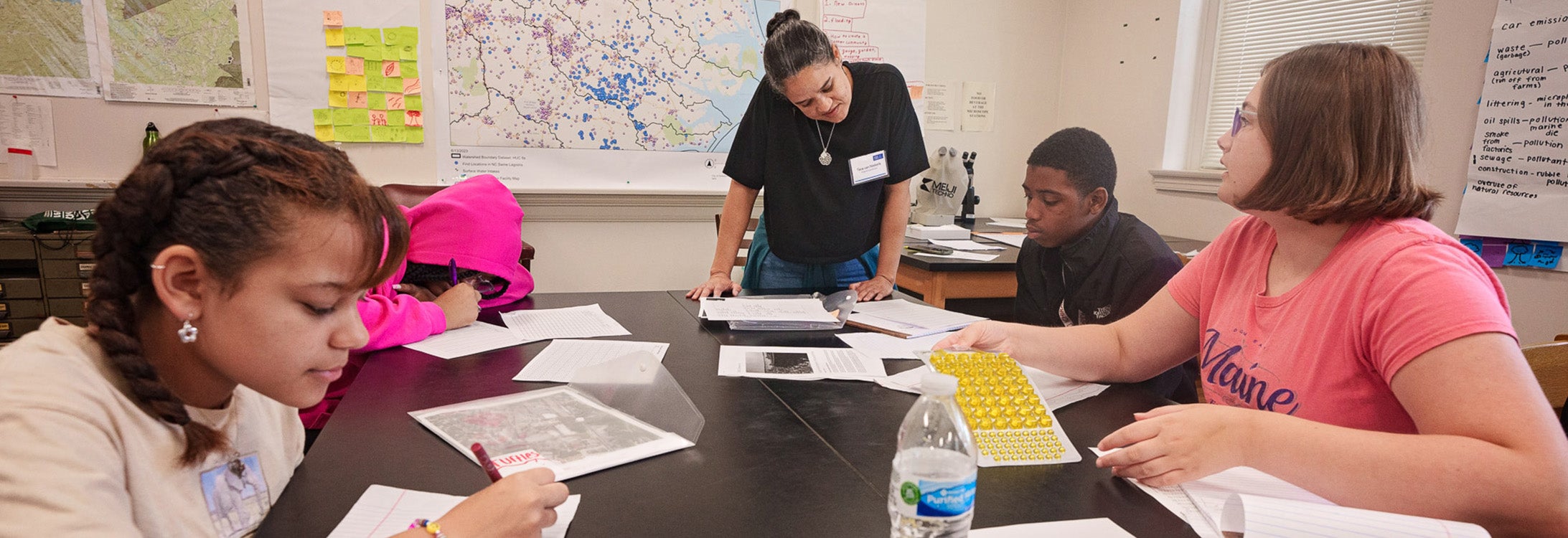 Students compile data from water samples in ECU’s Community Science Camp in Graham Building.