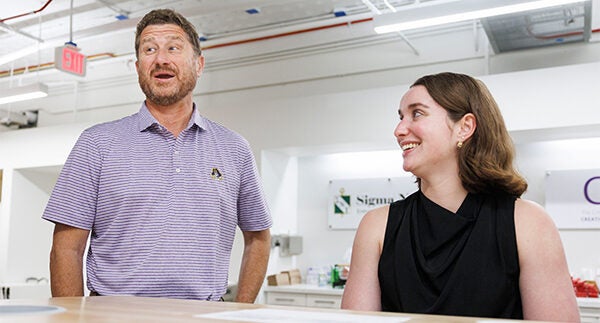 COB Dean Mike Harris, left, catches up with Jordan Anderson during July’s Summer Innovation Academy. The two met when Anderson attended the first academy in 2018.