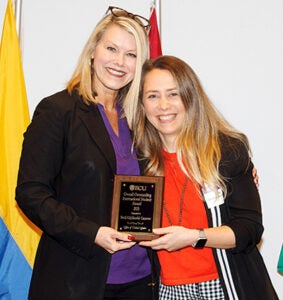 Betül Küçükardalı Cansever earned the Overall Outstanding International Student Award presented by Dr. Angela Lamson. (ECU photo by Rhett Butler)