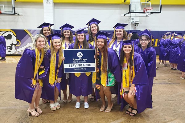 Members of the first CARE Corps teaching cohort graduated in May after completing a year of service in Pitt, Greene and Lenoir counties. 