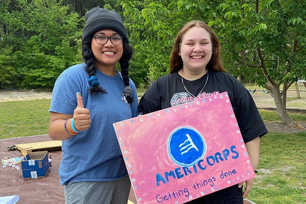 East Carolina University alumna Nicole Silva, right, received her first teaching job through the connections she made in CARE Corps.