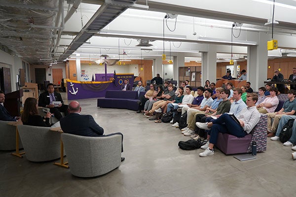 Students listen to panel of entrepreneurs inside the Isley Innovation Hub. 