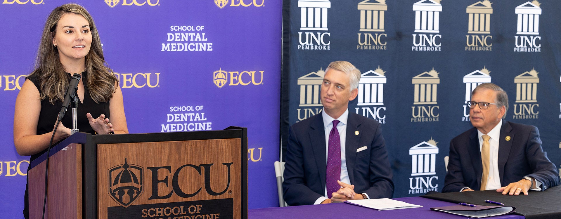 Dr. Kennedi Henry, an alumna of both the ECU School of Dental Medicine and the University of North Carolina at Pembroke, shares her story during the signing of an early assurance agreement between the two institutions.
