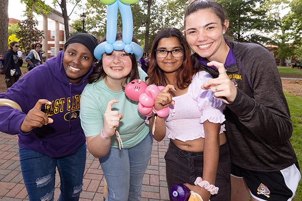 Balloon animals are one of the activities for students at Barefoot on the Mall. 
