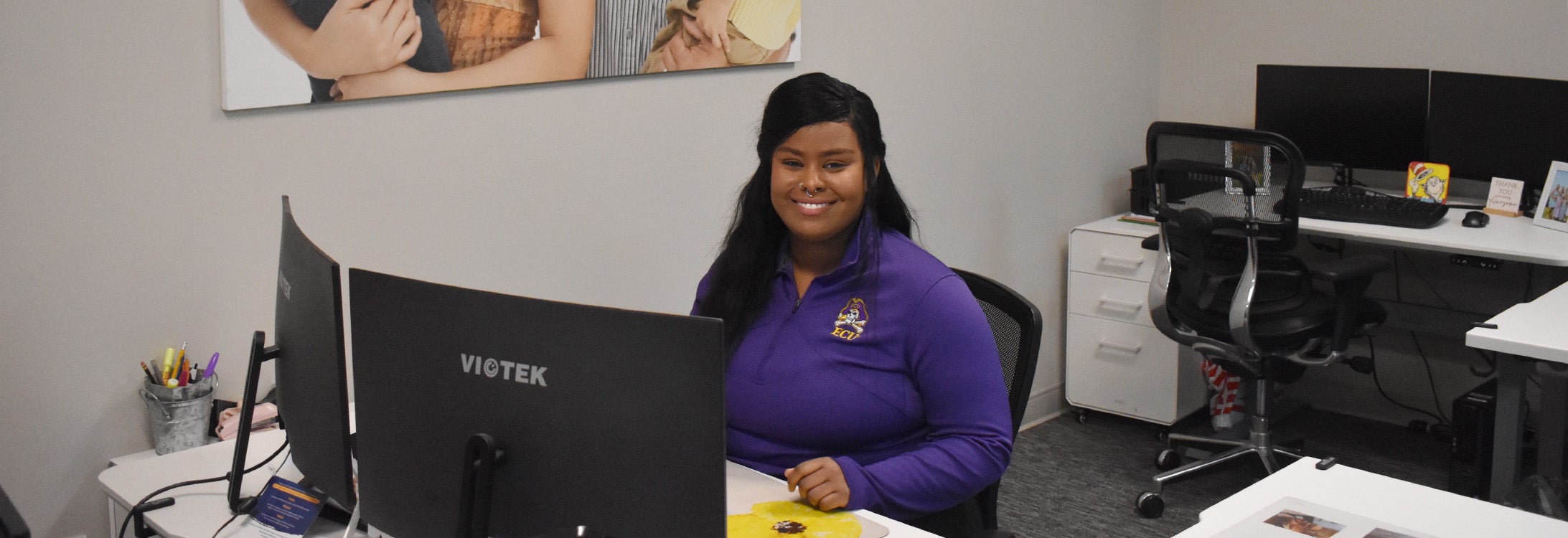 East Carolina University psychology major Jasmine Johnson uses her computer science experience to assist One Place with an important database project that benefits the community.