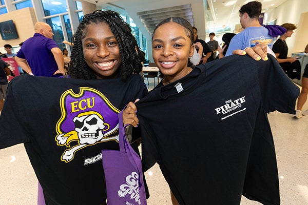 Jessiah Talley, left, and Tasiana Andrews claimed shirts at Pirate Palooza. (ECU photo by Rhett Butler)