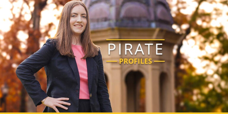 Woman stands in front of a cupola